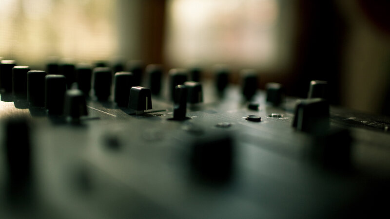 Close-up of audio mixer knobs