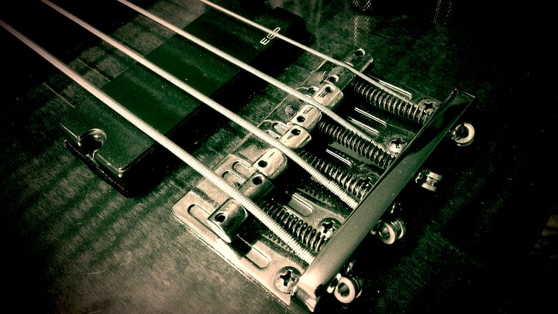Close-up of Bass Guitar Bridge