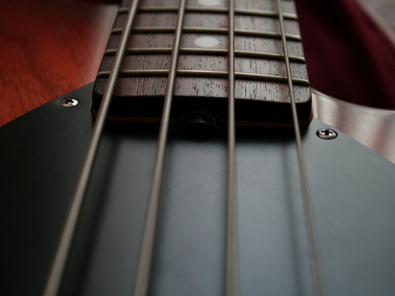 close-up of bass guitar strings