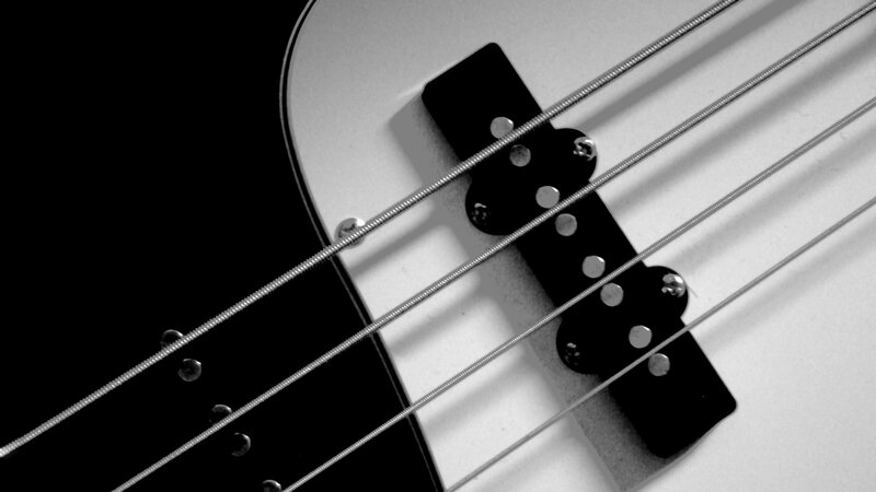 close-up of bass guitar strings