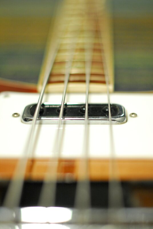 close-up of bass guitar strings