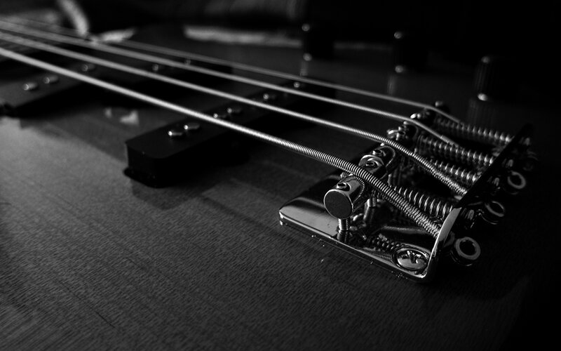 Close-up of Bass Guitar Strings — Black
