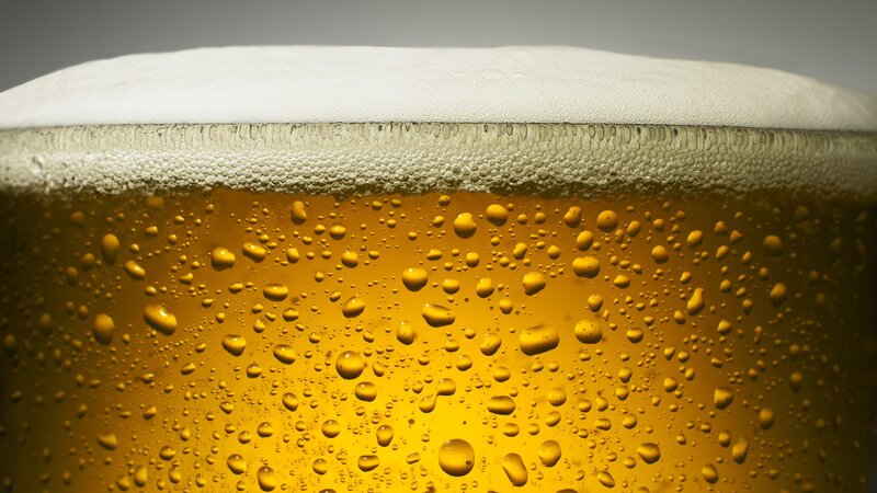 close-up of beer foam and bubbles