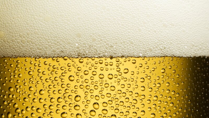 close-up of beer foam and bubbles
