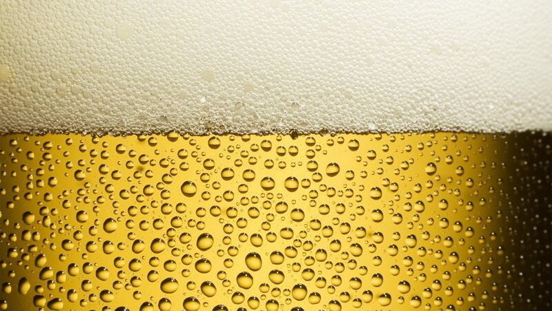 close-up of beer foam and bubbles