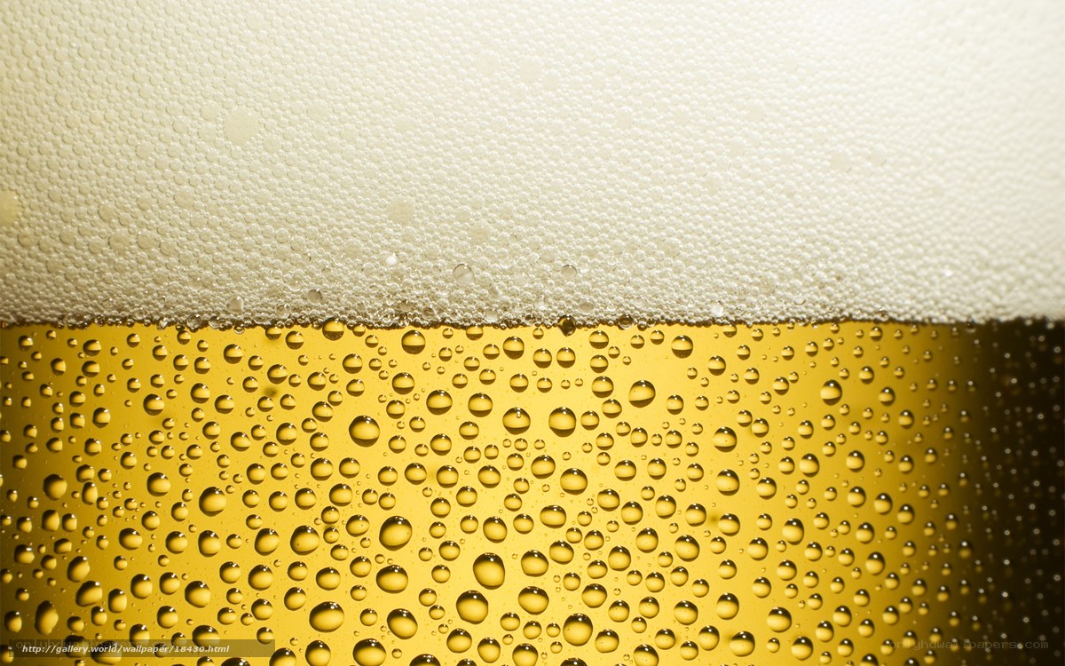 Close-up of beer foam and bubbles