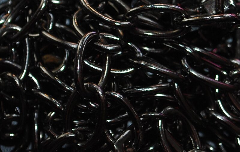 close-up of black metal chains