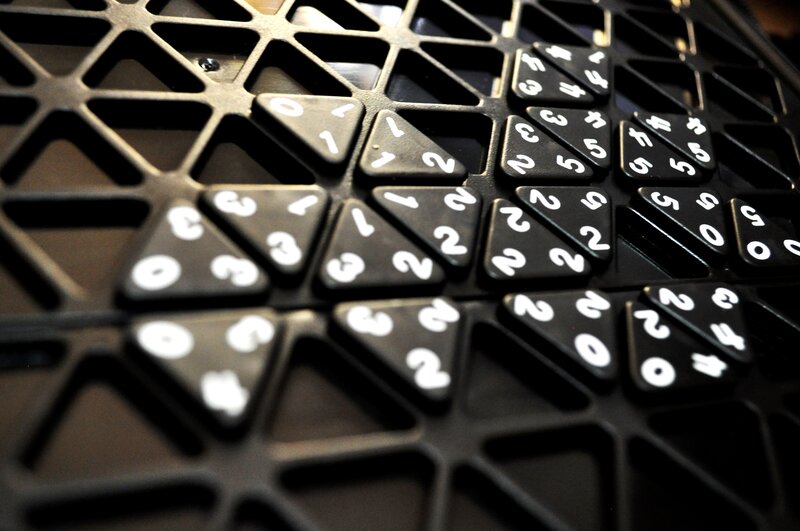 close-up of black triangular tiles