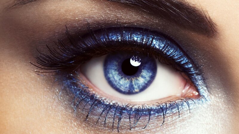close-up of blue eye with makeup