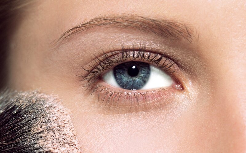 close-up of blue eye with makeup