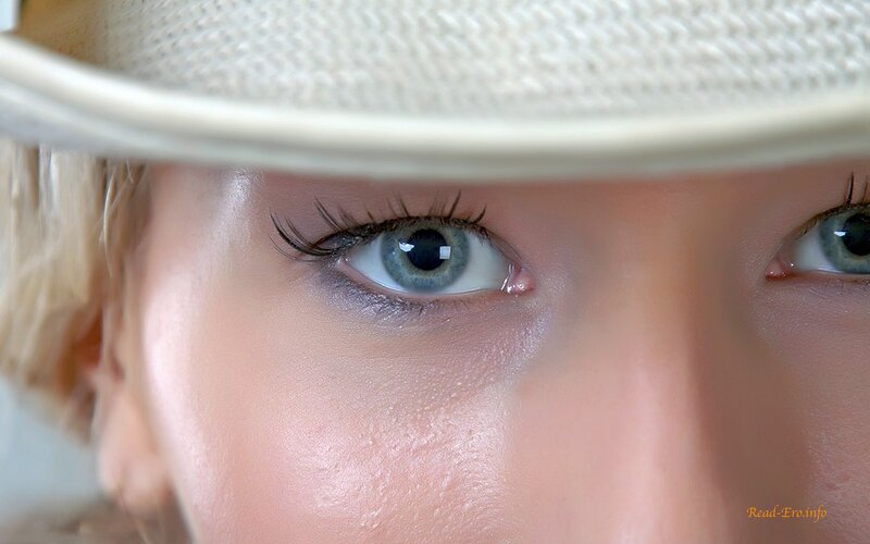 close-up of blue eyes under hat