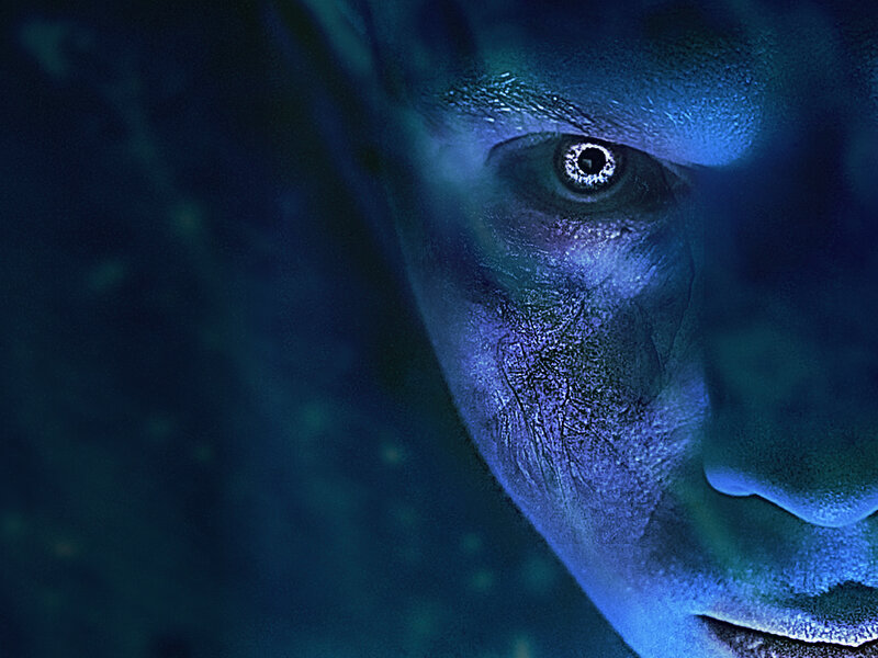 close-up of blue-skinned face