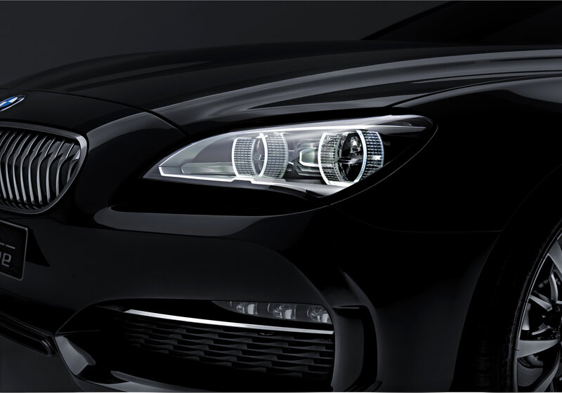 Close-up of BMW headlights