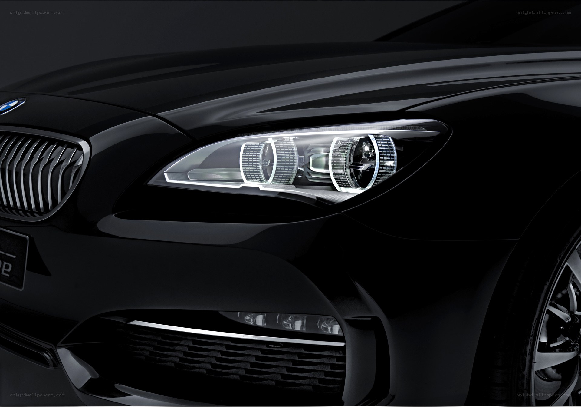 Close-up of BMW headlights