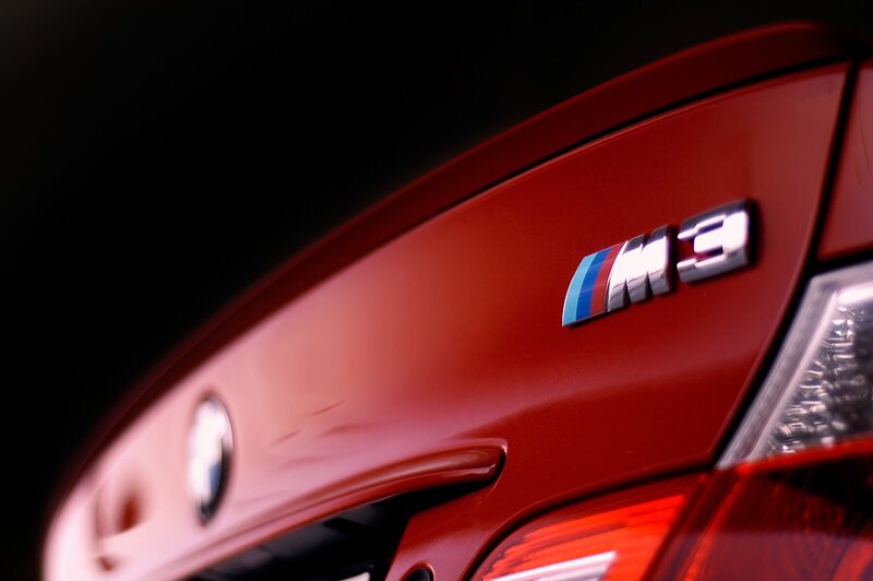 close-up of BMW M3 badge