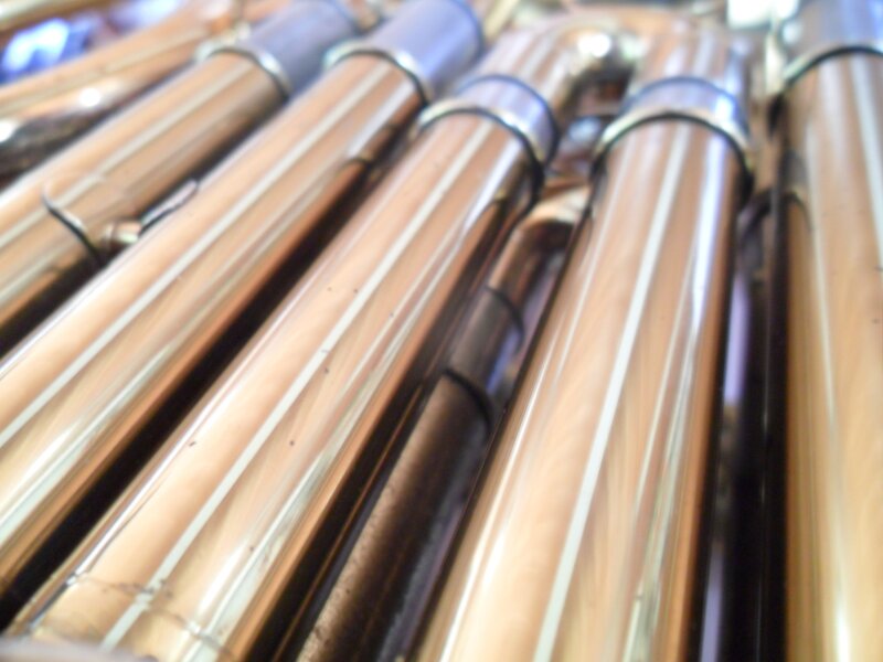 Close-up of brass instrument pipes