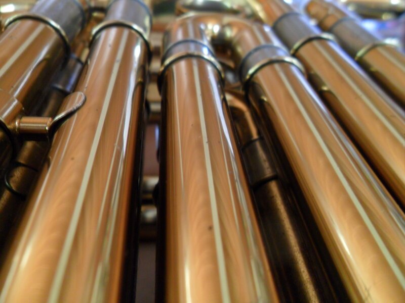 close-up of brass instrument pipes