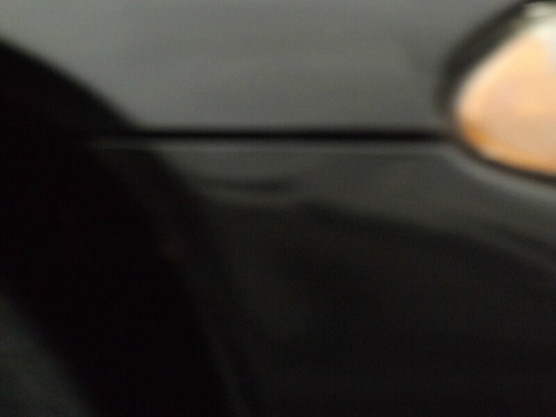 Close-up of Car Body — Black