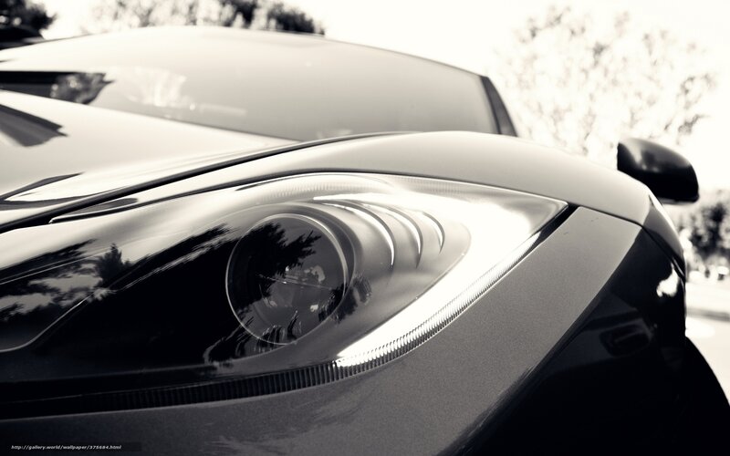 Close-up of Car Headlight — Black, Dramatic