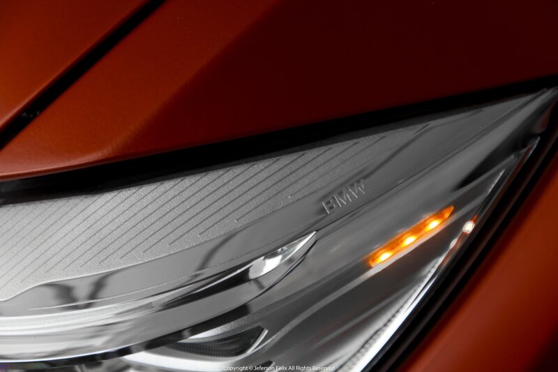 Close-up of Car Headlight — Red, Dramatic