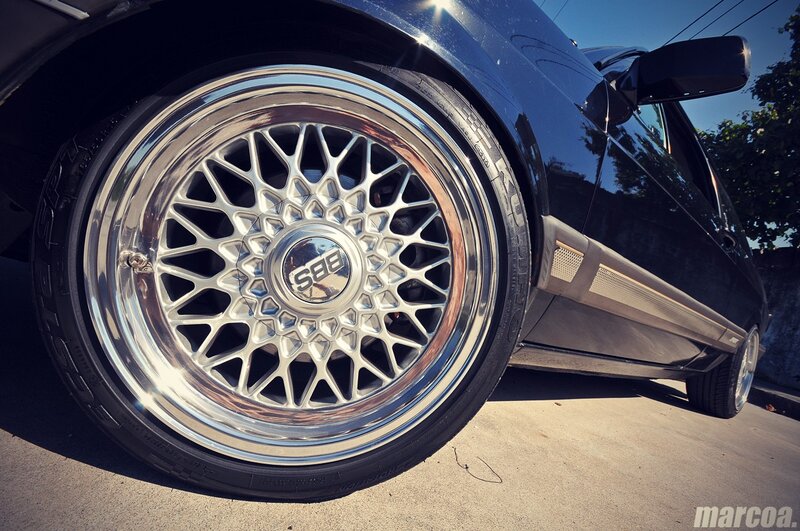 Close-up of Car Wheel — Black, Dramatic, Afternoon, Photograph