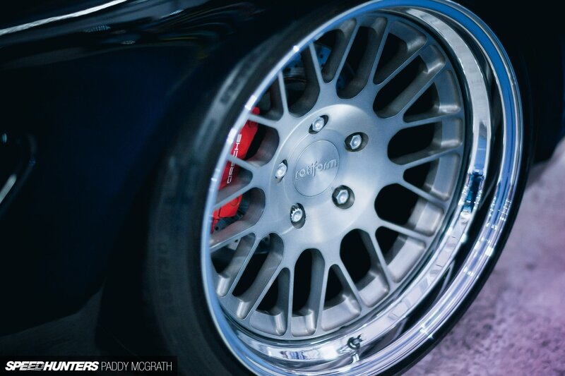 Close-up of Car Wheel — Black, Dramatic, Photograph, Brake Caliper