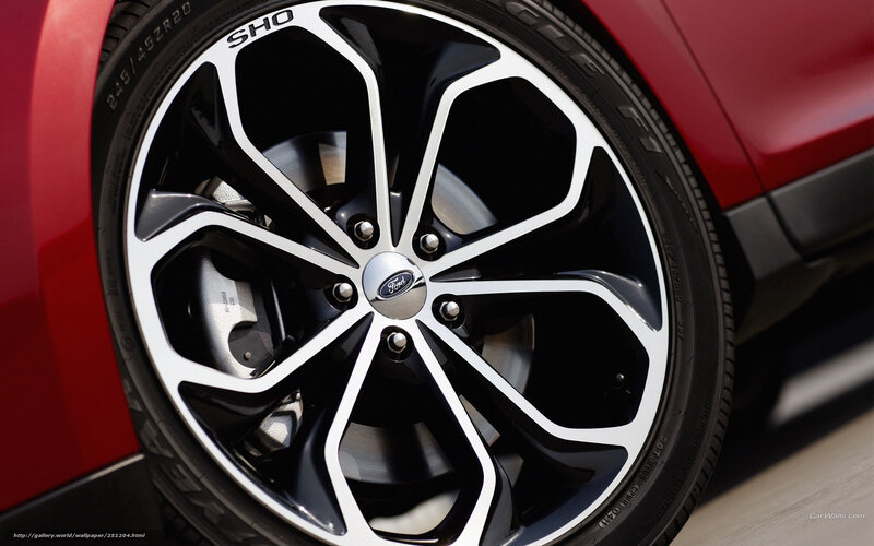 Close-up of Car Wheel — Red, Dramatic, Photograph