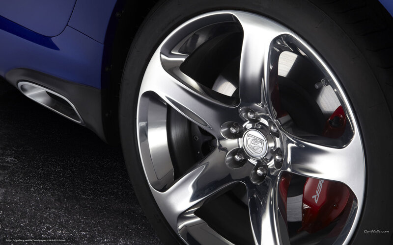 Close-up of Car Wheel — Silver, Dramatic, Photograph