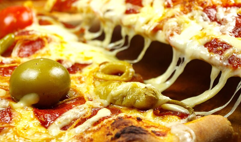 close-up of cheesy pizza