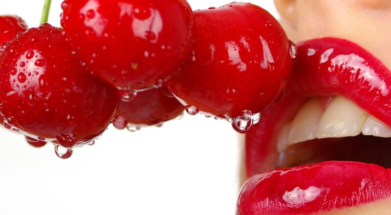 Close-up of Cherries and Lips