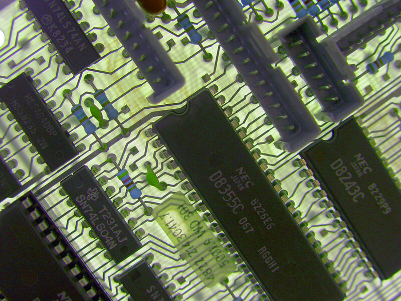 Close-up of Circuit Board — Green, Technical, Photograph, Chips, Resistors, Connectors