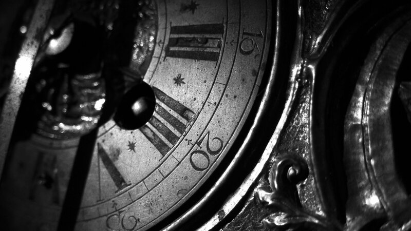 Close-up of Clock Face — Black, Dramatic, Photograph, Roman Numerals