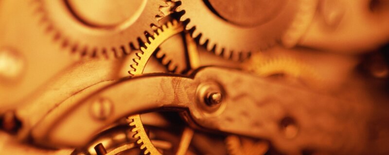 Close-up of Clock Gears — Gold