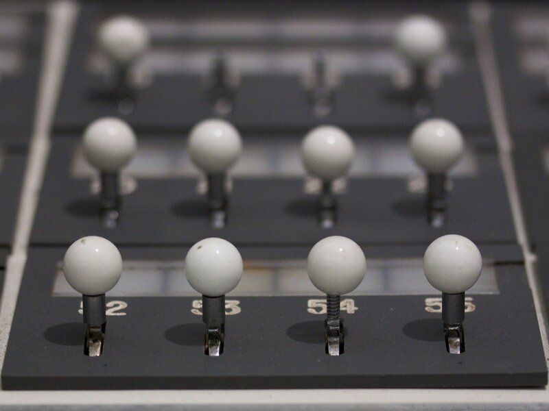 Close-up of control panel knobs