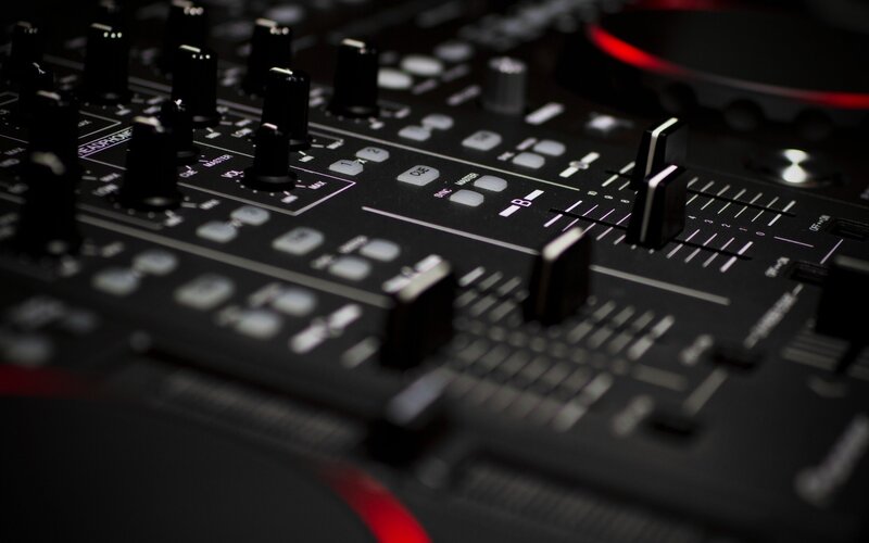 close-up of DJ mixer controls