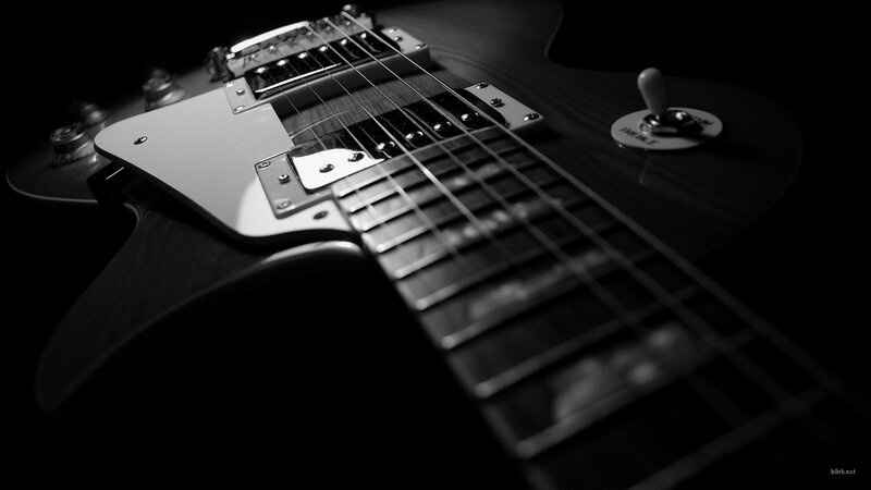 Close-up of Electric Guitar — Black, Dramatic
