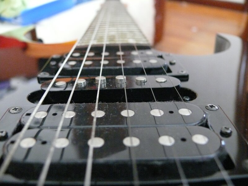 close-up of electric guitar pickups