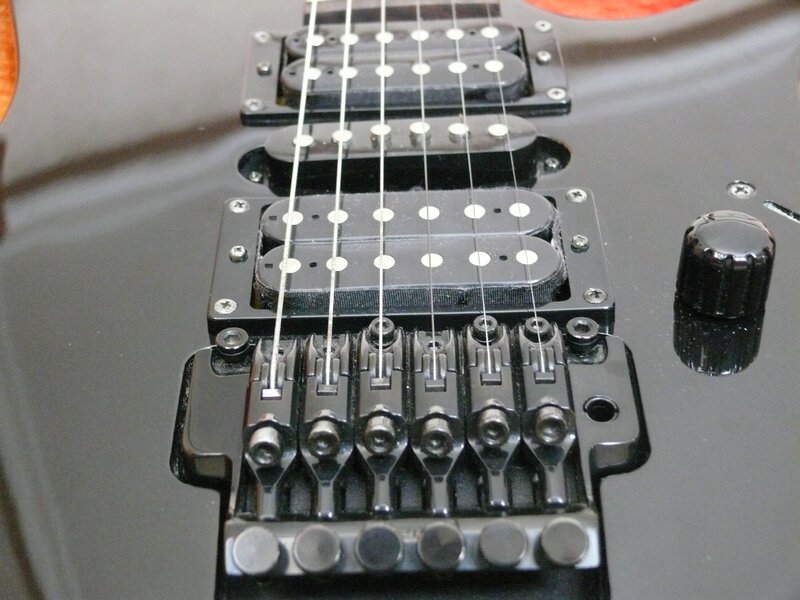 close-up of electric guitar pickups