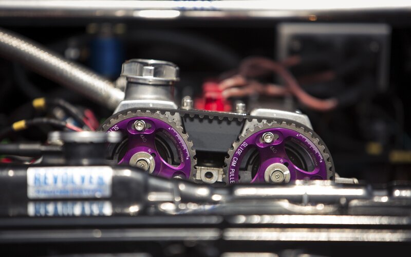 close-up of engine cam pulleys