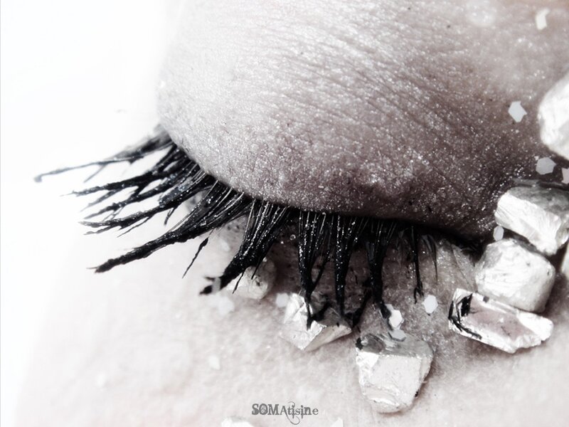 close-up of eye with crystals