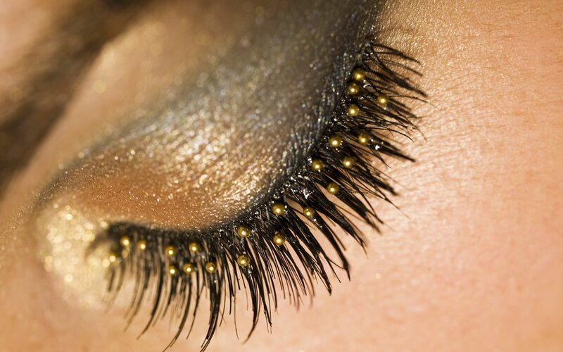 close-up of eye with glitter makeup