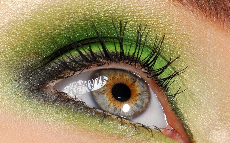 close-up of eye with green makeup