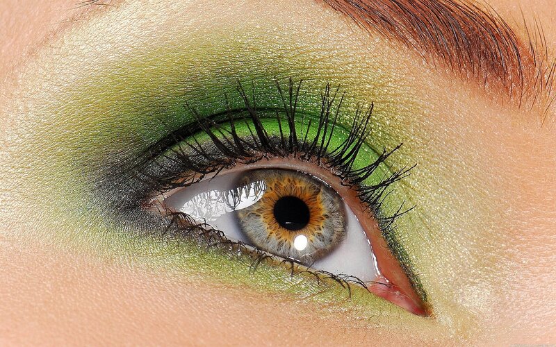 close-up of eye with green makeup