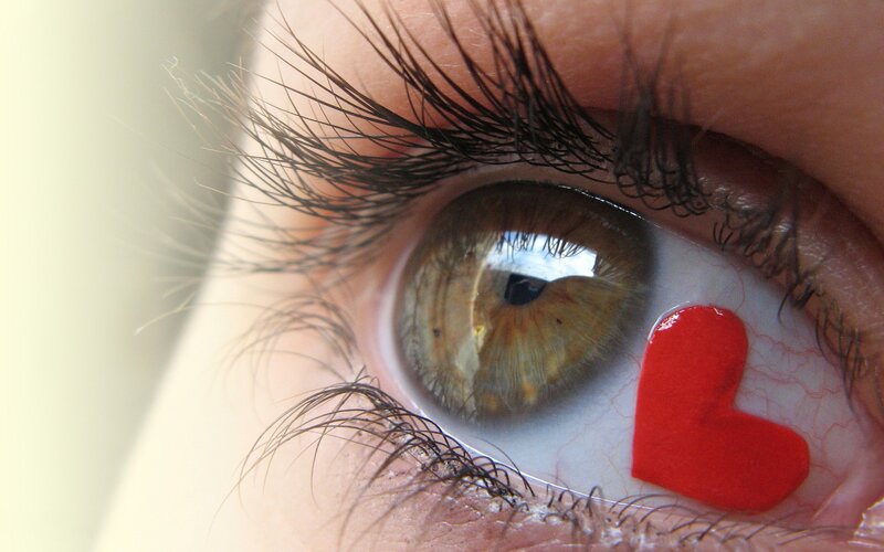 close-up of eye with heart