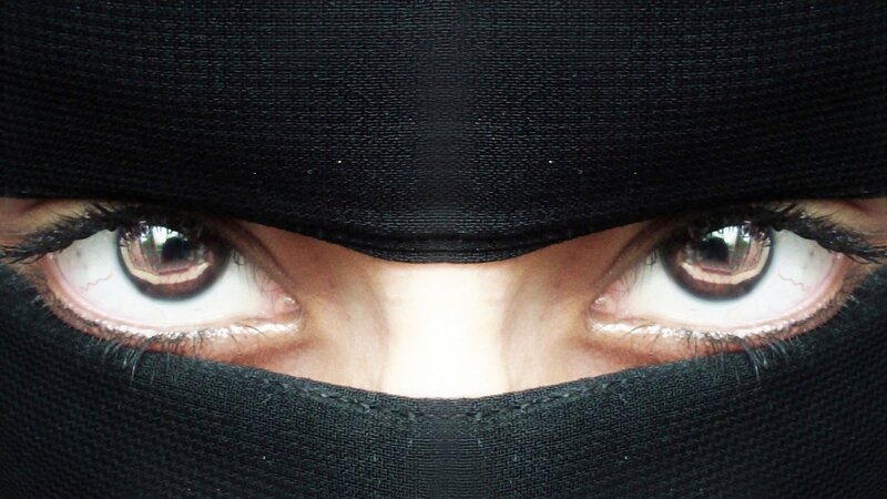 close-up of eyes through niqab