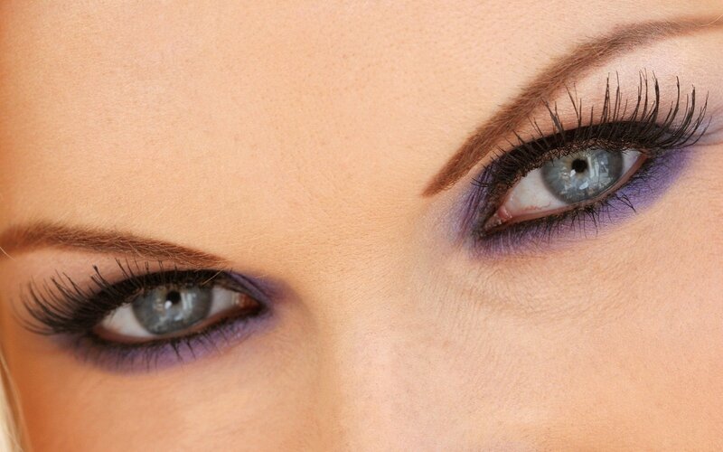close-up of eyes with purple makeup