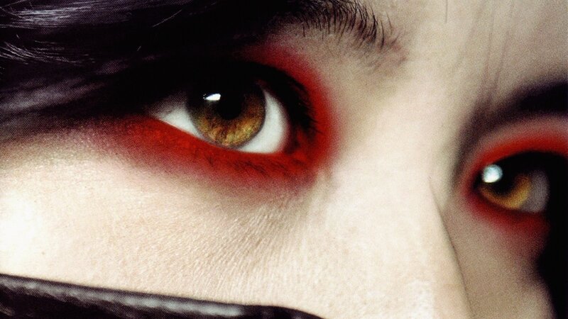 close-up of eyes with red makeup