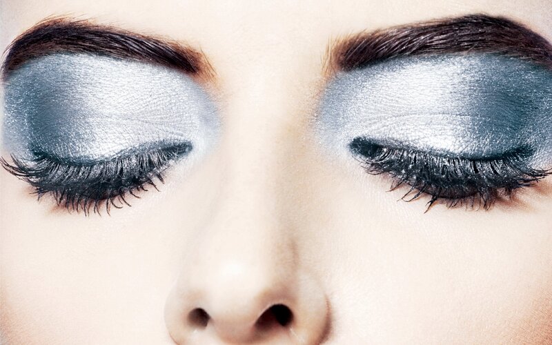 close-up of eyes with silver makeup