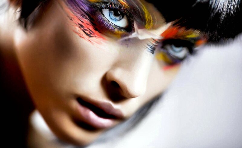 close-up of face with colorful makeup