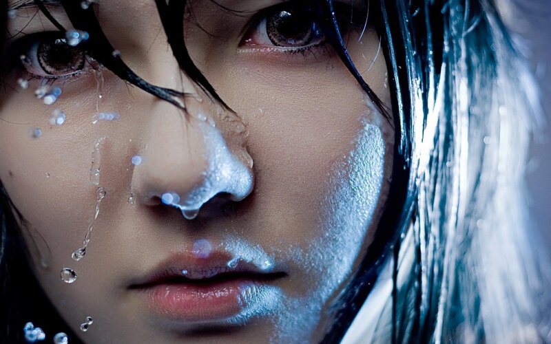 close-up of face with water